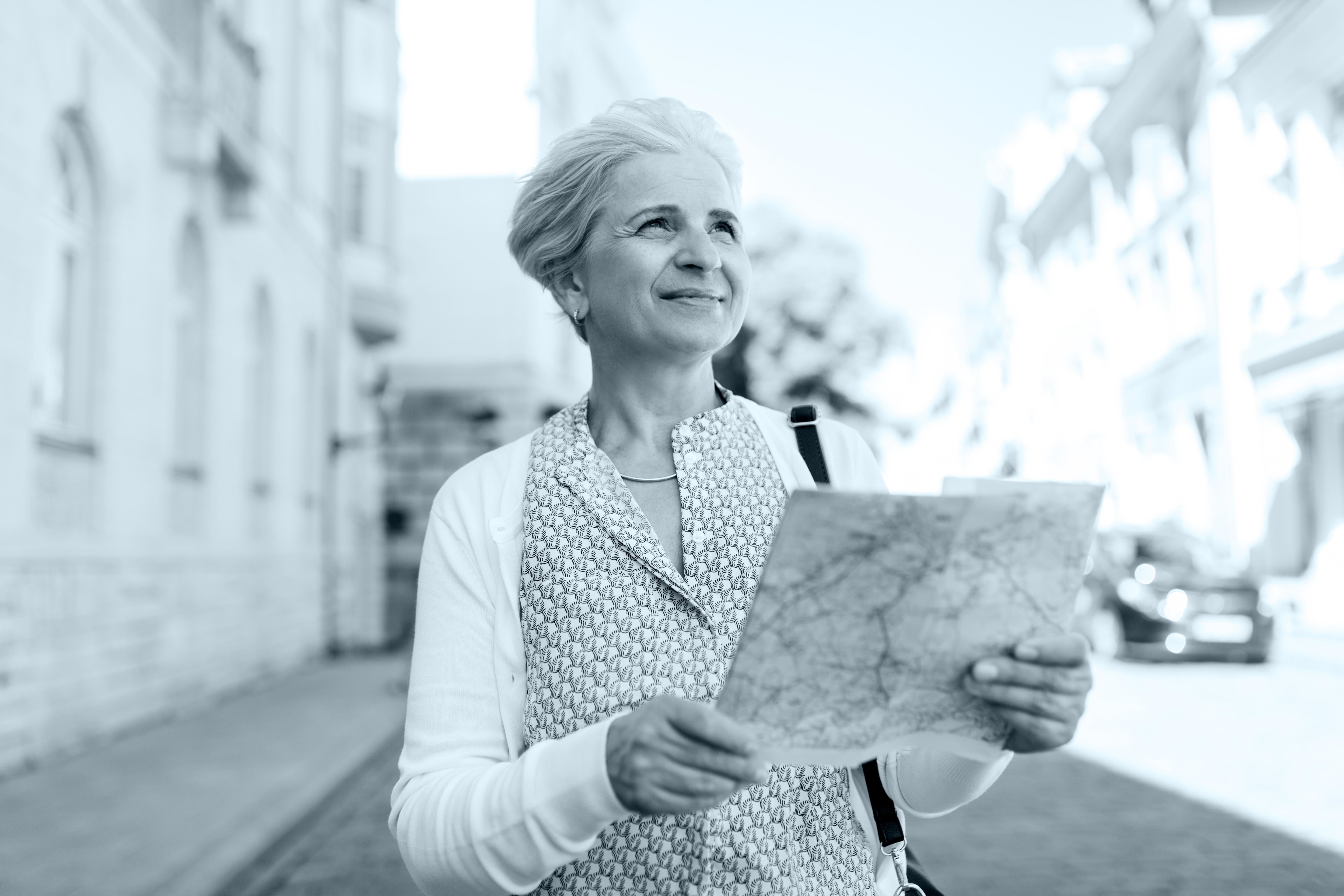 senior woman happy with map